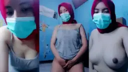 ABG Jilbab Merah Tembus Pandang Mendesah Video by NoBokep